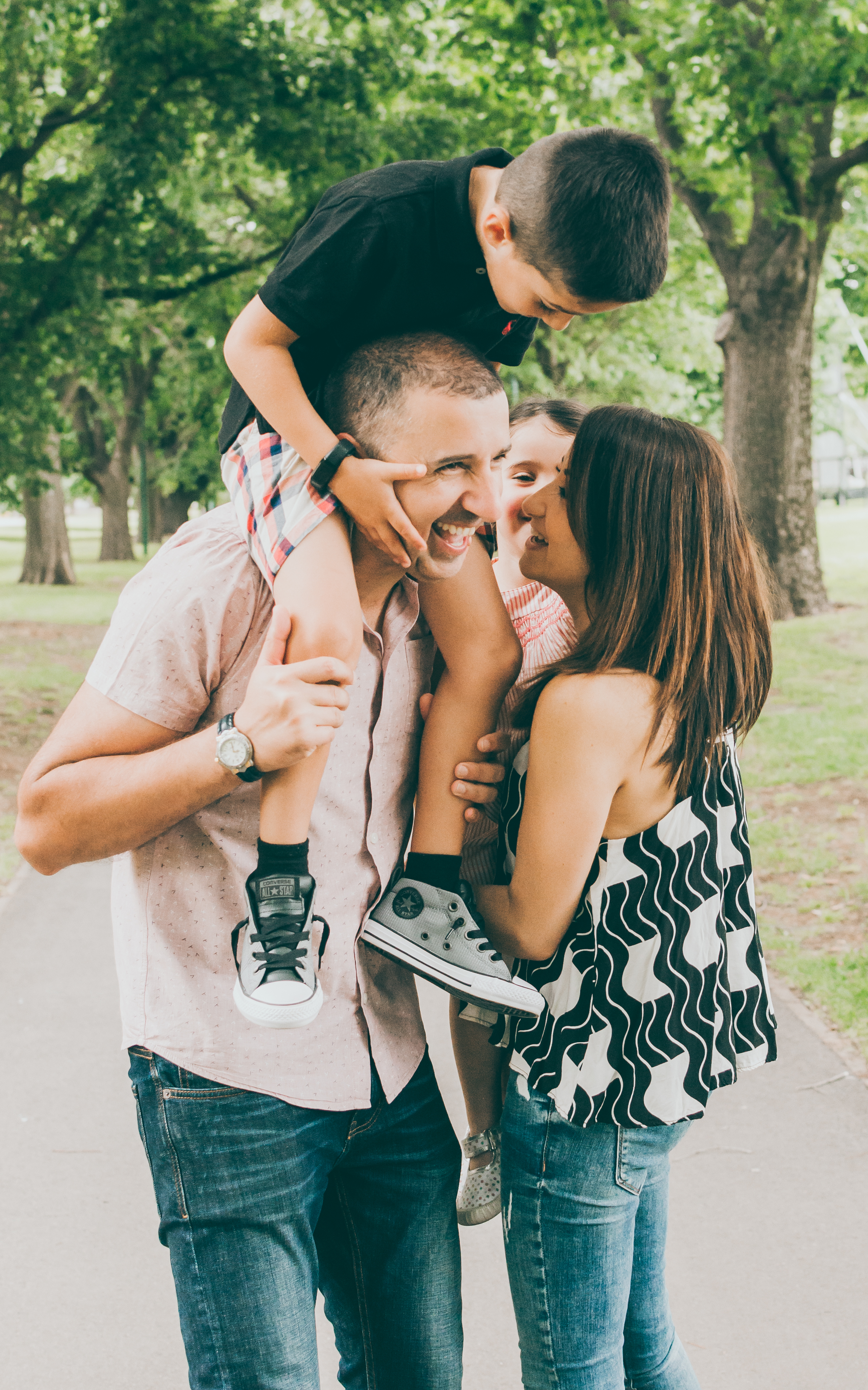Melbourne Lifestyle photographer Liyat G Haile documents and captures happy family whispering, smiling, interacting and connecting
