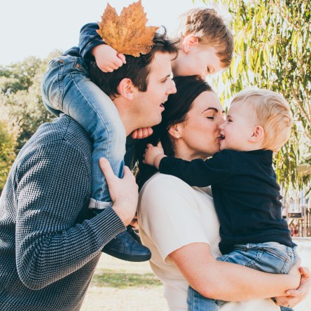 Melbourne Lifestyle Photography happy family hugging, kissing, interacting and connecting during Autumn season