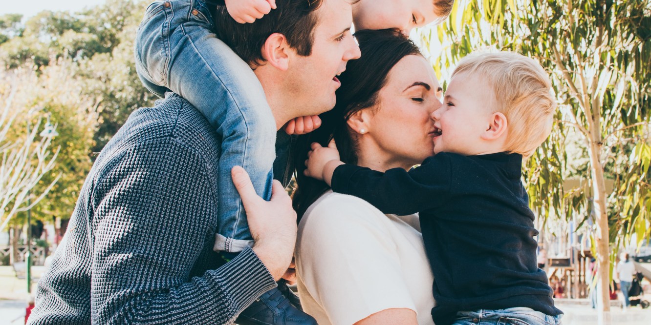 Melbourne Lifestyle Photography happy family hugging, kissing, interacting and connecting during Autumn season